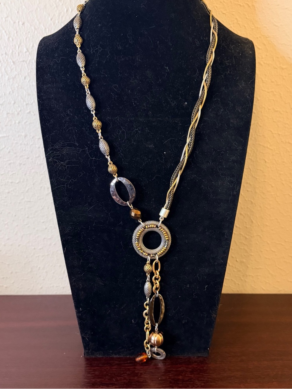 Chico's Multi-Tone Metals Features an Asymmetrical Drop Design with Amber